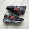 Reebok Zig Classic black red sneaker flat lay marble