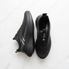 PROPULSION black running shoes flat lay white marble