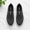 Skechers GoWalk Charcoal flat lay white marble lifestyle